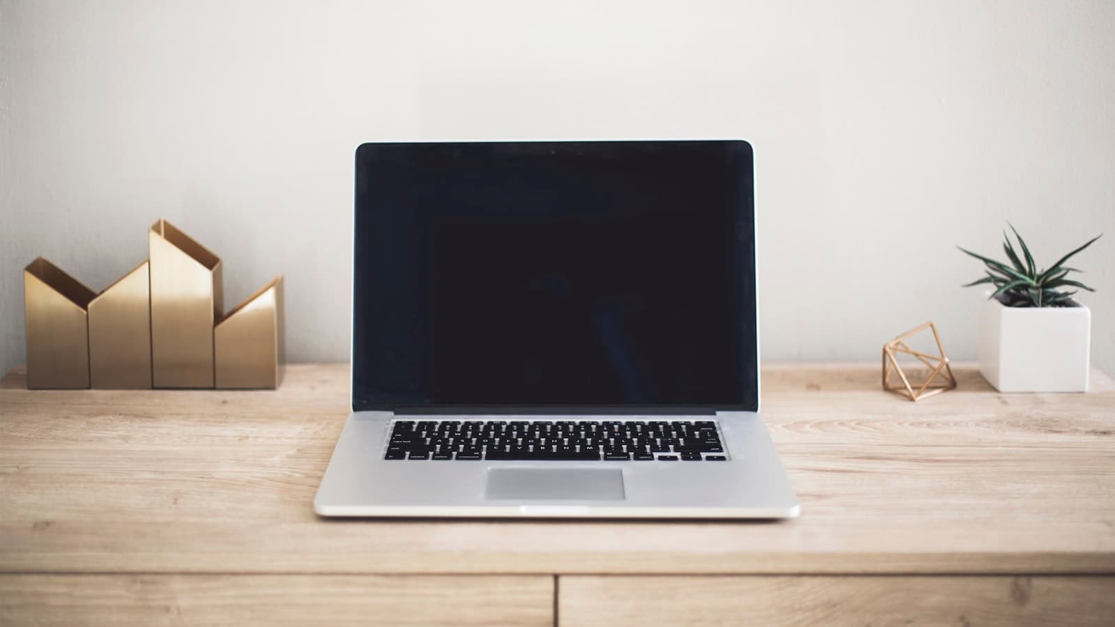 Laptop being cleaned carefully at home