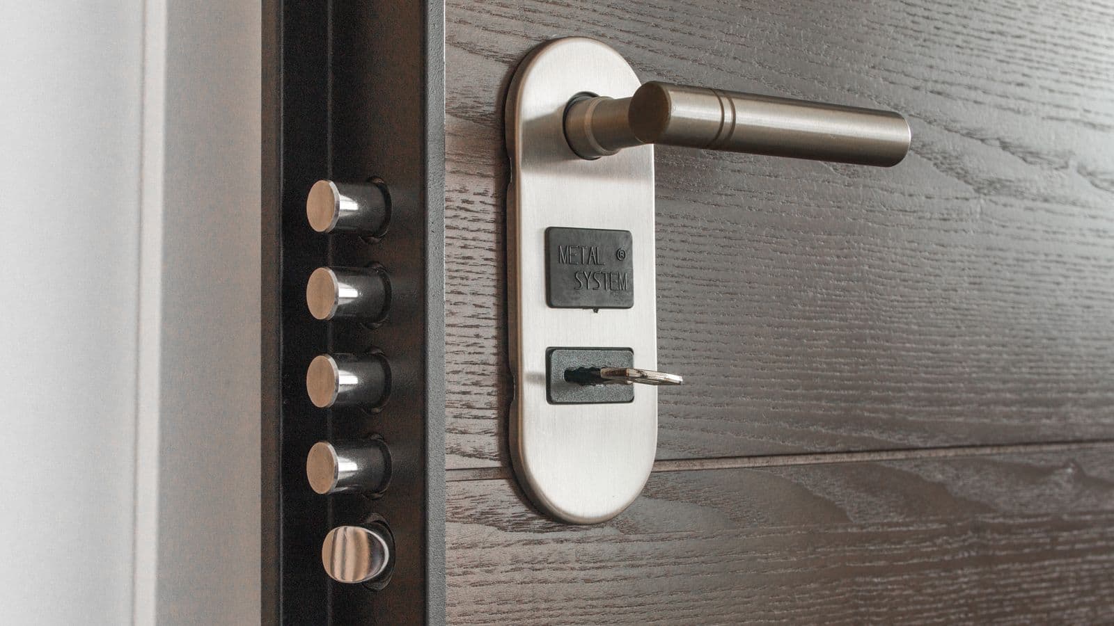 Residential door with a multi-bolt security lock and key
