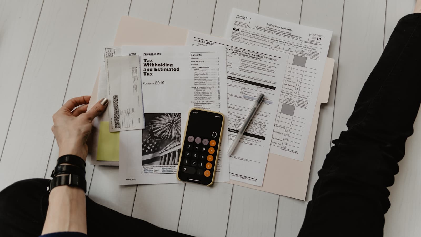 Notebook and calendar used for household tracking
